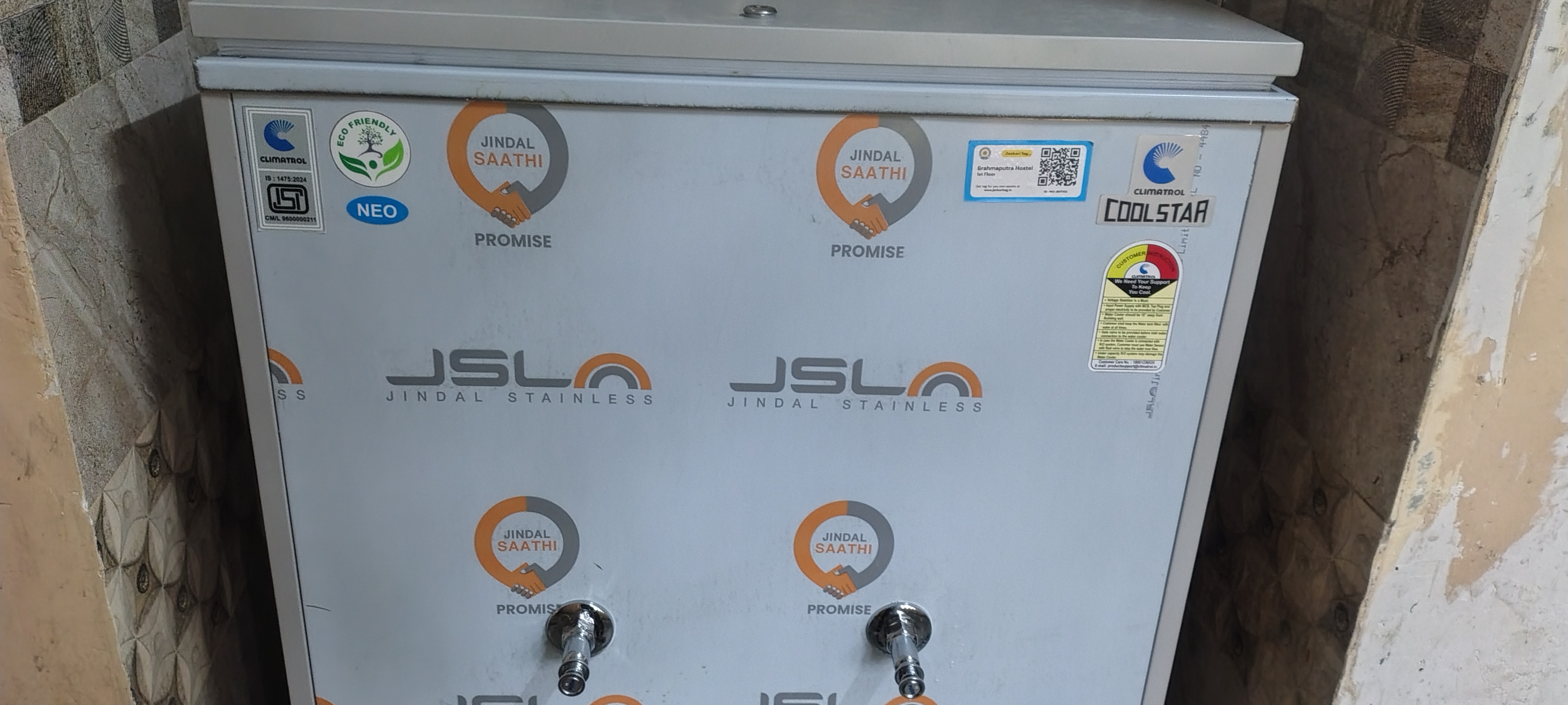 WaterCare tag mounted on water cooler